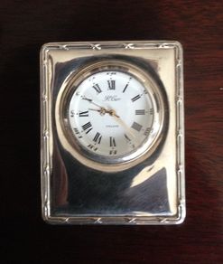 Small sterling silver clock