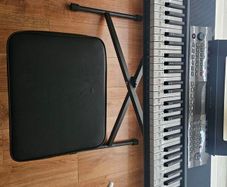 Barely used 61 keys  keyboard with stand and stool in perfect condition, model no SM-61K