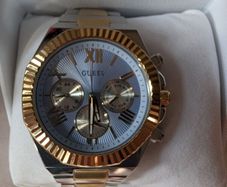 Mans guess watch with box