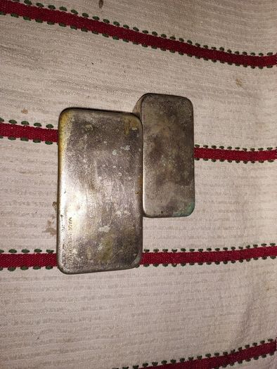 Vintage fly fishing tins