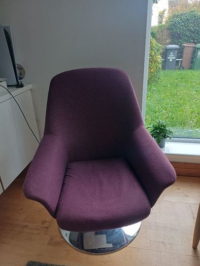 Purple swivel armchair with chrome base
