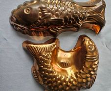 Vintage copper fish moulds