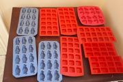 10 ice cube trays (various sizes/shapes)