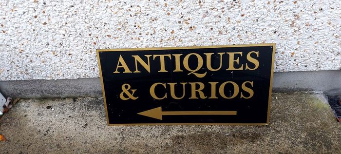 Antiques & Curios,hard plastic sign perspex. ,unusual and lovely colours,,32 inches length, 16 inches height,,buyer collects, see pictures for condition, used condition few marks nicks