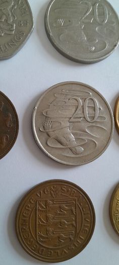 Coins a mix of different countries 28 coins in total registered post included