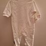 A selection of brand new baby clothes and items Image 9