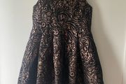 Black and bronze dress with flower corsage age 6