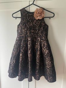 Black and bronze dress with flower corsage age 6