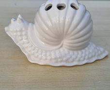 Italian white ceramic flower frog / small snail-shaped vase