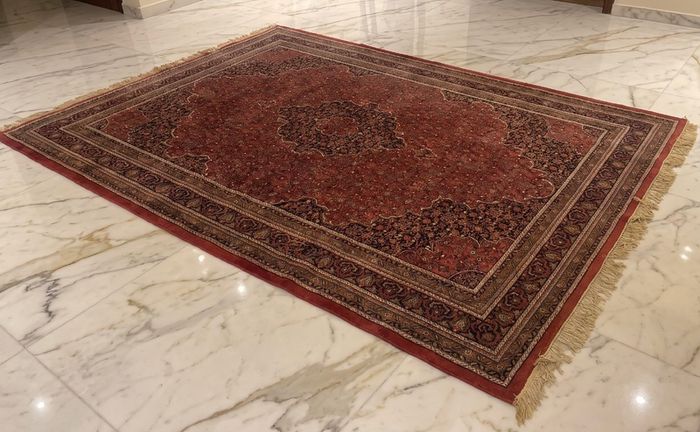 This is a good old hand knotted carpet with no wear