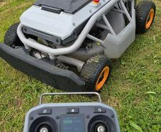 Remote controled lawn mower for sale.