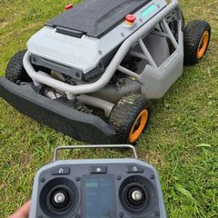 Remote controled lawn mower for sale.