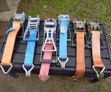Tensioners for the transport belt