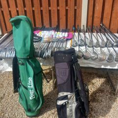 A selection of golf clubs and bags. Golf balls