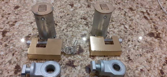 Heavy duty roller shutter door ground locks with padlocks