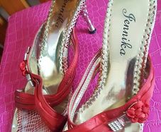 Worn red heels size uk3