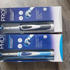 Pair of unopen electric toothbrushes