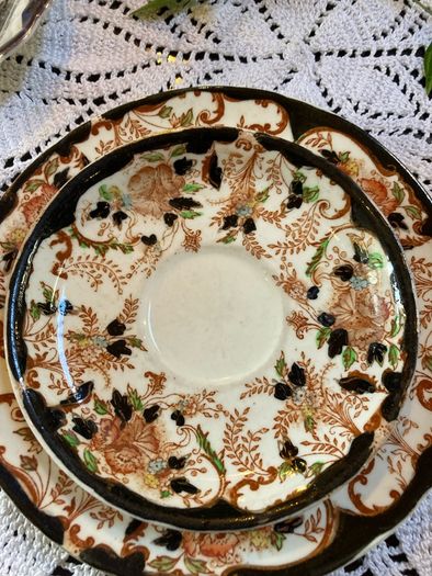 An antique bone china trio
