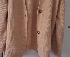 Cardigan says xs but its fit 10