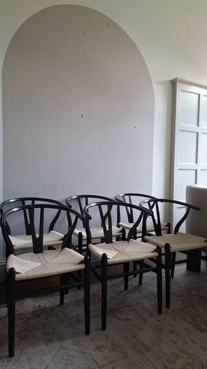 Six Iconic Black Wishbone Chairs