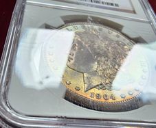1904 O Morgan Silver Dollar Stunning Rainbow Toned Gem NGC
