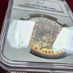 1904 O Morgan Silver Dollar Stunning Rainbow Toned Gem NGC