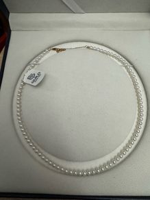 Freshwater pearl necklace with GUILD certificate
