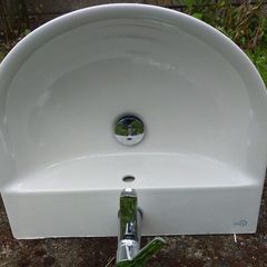 Sink with mixer tap.