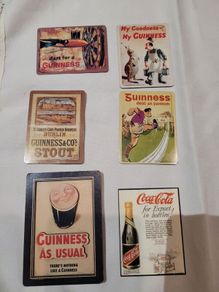 Guinness and Coca-Cola fridge magnets