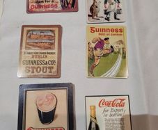 Guinness and Coca-Cola fridge magnets