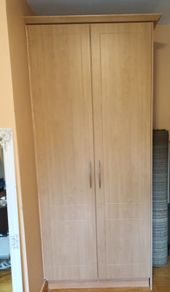 Double wardrobe with hanging rails and shelving