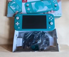 Nintendo Switch Lite 32gb Excellent Condition with Charger and Box.