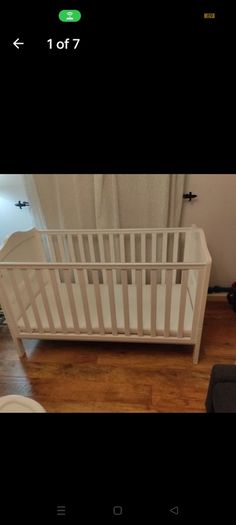 White Baby Cot with mattress with removable washable mattress protector