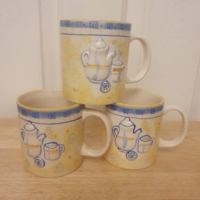 Mugs/Ceramic Mugs (4). .. "Ideal for Shelf Display in a Cafe or Kitchen"  Cream with Yellow and Blue