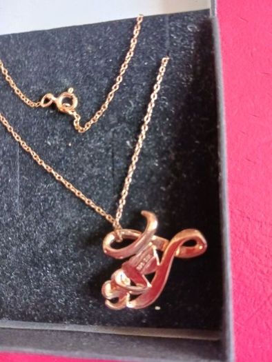 Sterling silver,gold plated with diamonds,pendant