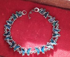 A charming butterfly bracelet.