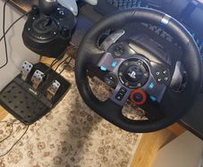 Two Logitech steering wheels G29 and G920
