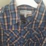 Shirt with sleeves that can be rolled up and buttoned. Image 2