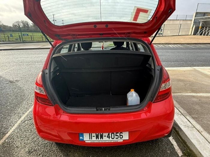 2011 Red Hyundai i20 (Price Negotiable)