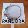 Pandora bracelet with authentic Pandora charms included and giftbox Image 2