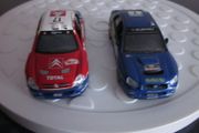 Two WRC Toy Rally Cars