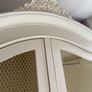 Large armoire with distressed finish, carvings and chicken wire detail Image 2