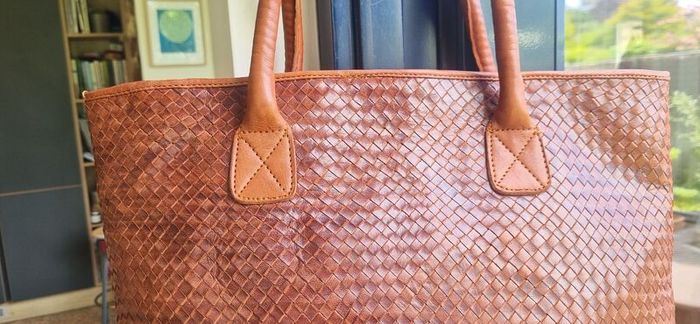 brown leather woven shoulder bag
