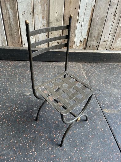 Charlie Chaplin resin sculpture figurine in metal chair