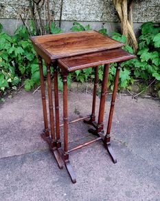 Antique pair of nesting tables
