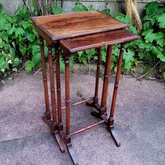 Antique pair of nesting tables