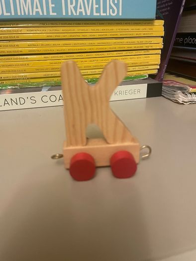 Assortment of wooden letters on wheels