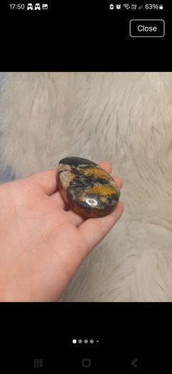 black and yellow tourmaline in quartz palmstone