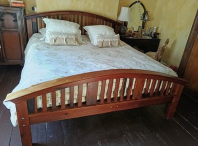Super King-sized solid bed approx. 6ft 6 inches by 8ft