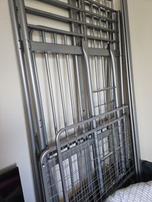 bunk bed with table and mattress